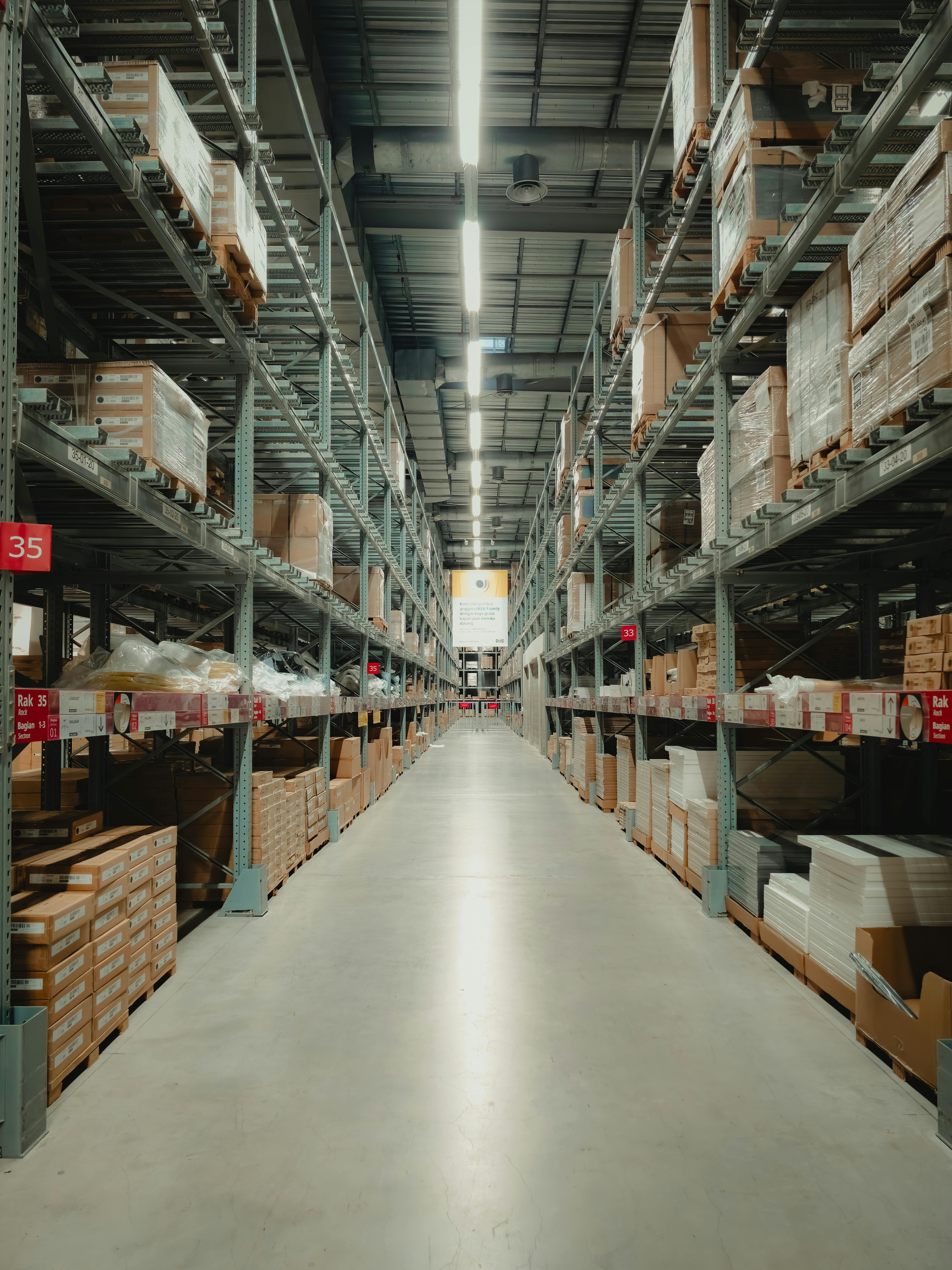 Organized warehouse aisle with clean floors